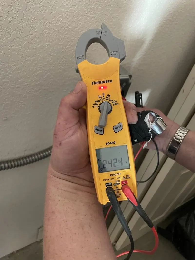 Voltage testing with clamp meter during Aluminum Wiring Replacement in Savage